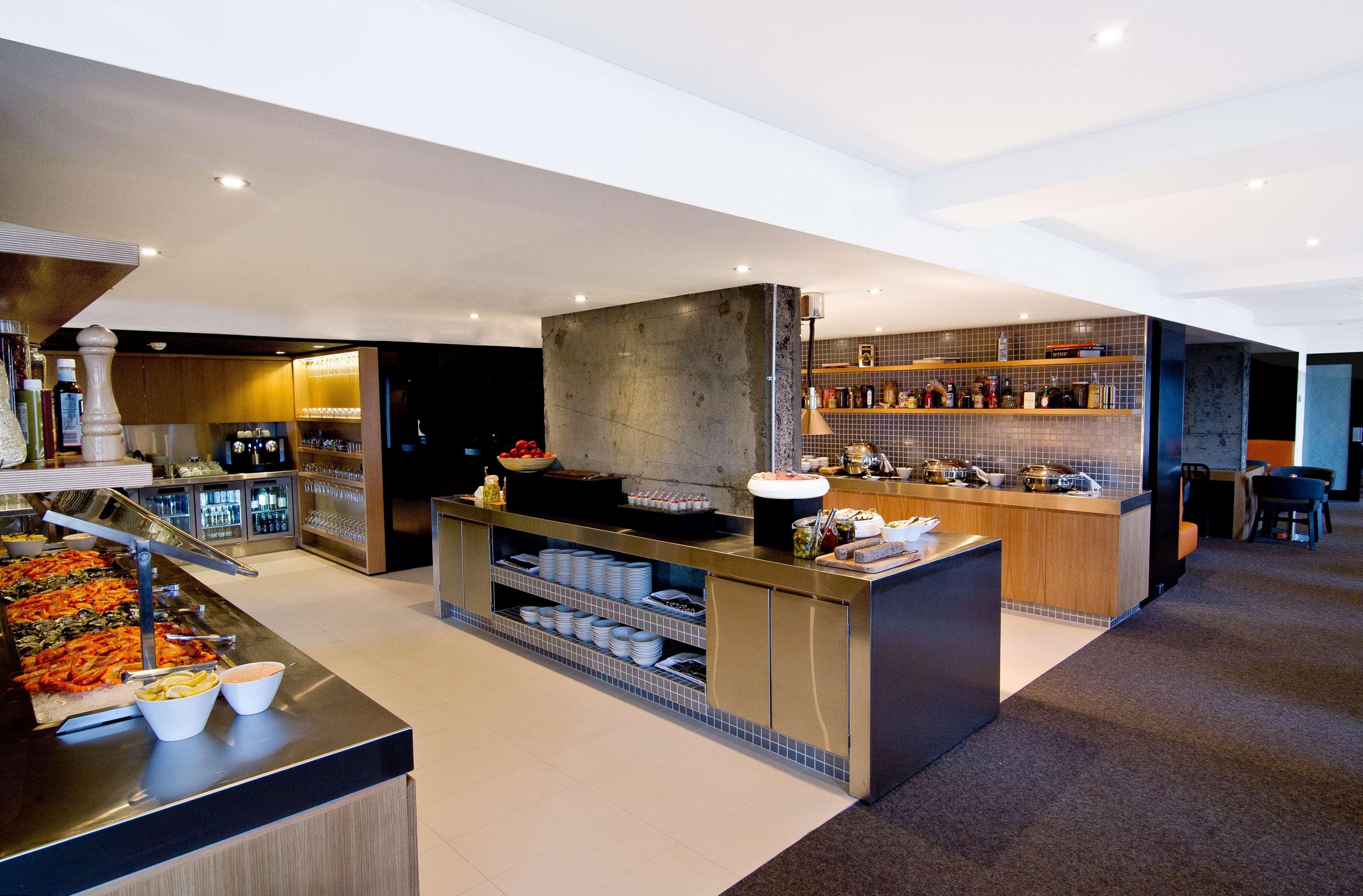 Hotel Hilton Sídney Restaurante foto The kitchen at the restaurant